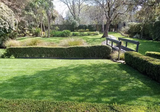 Manicured lawn with bridge
